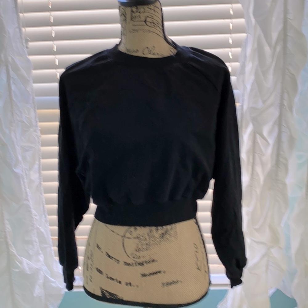 Black cropped sweatshirt.